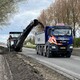 Het asfalt van de Noordervaart (N243) wordt gefreesd (verwijderd). Foto gemaakt op 26 april 2023